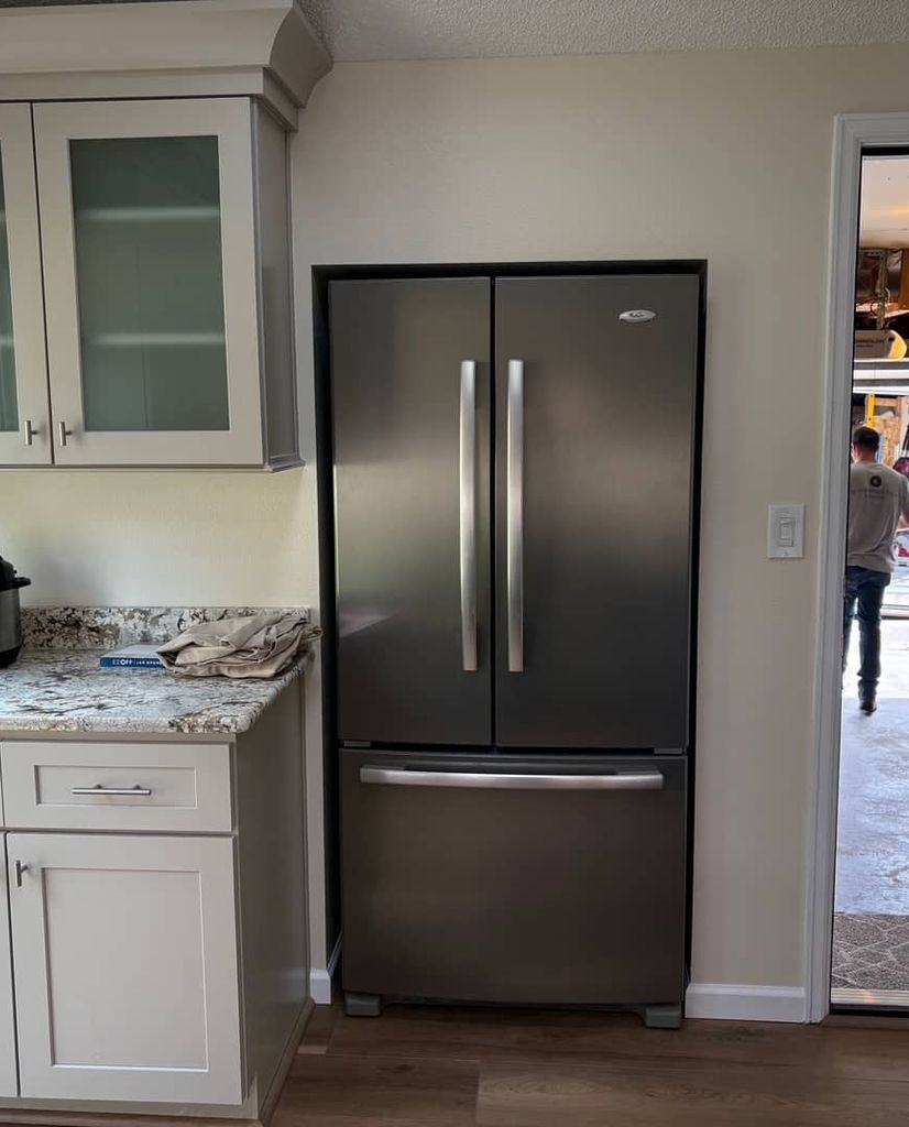 Bright kitchen with stainless steel appliances