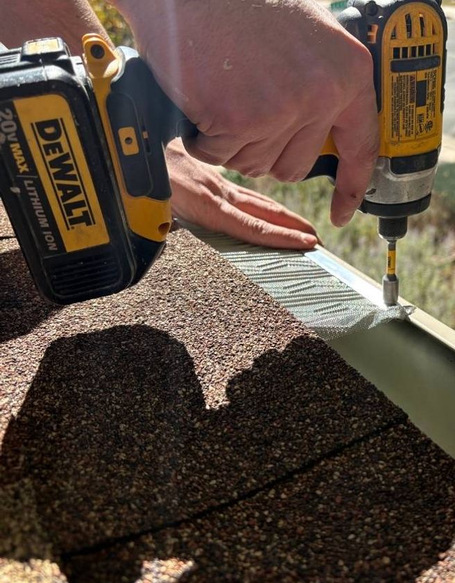 Roofing services, shingles and roofers at work